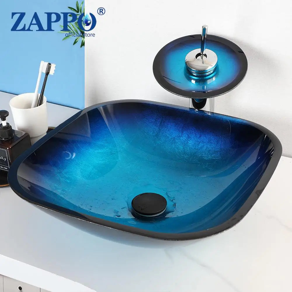 ZAPPO Blue Tempered Glass Vessel Sink – Oval Above-Counter Basin with Black Waterfall Faucet
