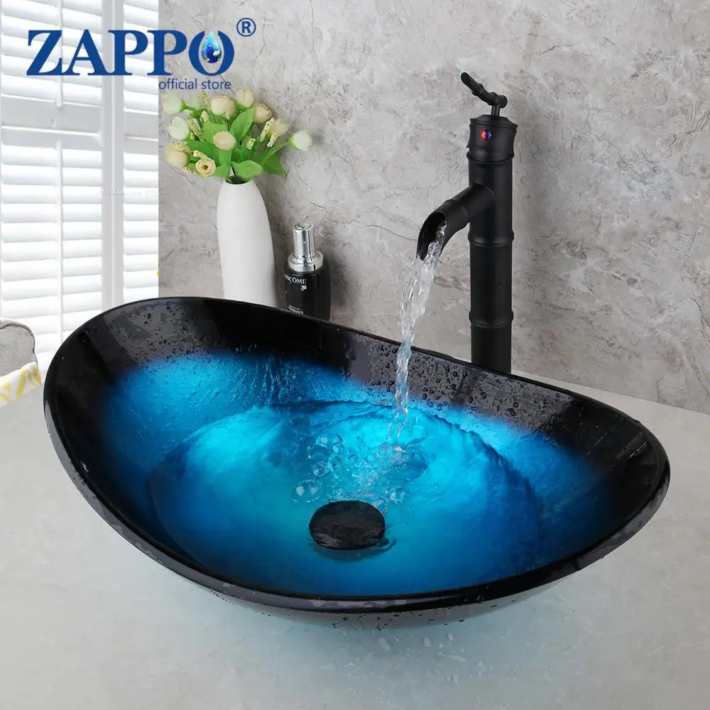 ZAPPO Blue Tempered Glass Vessel Sink – Oval Above-Counter Basin with Black Waterfall Faucet