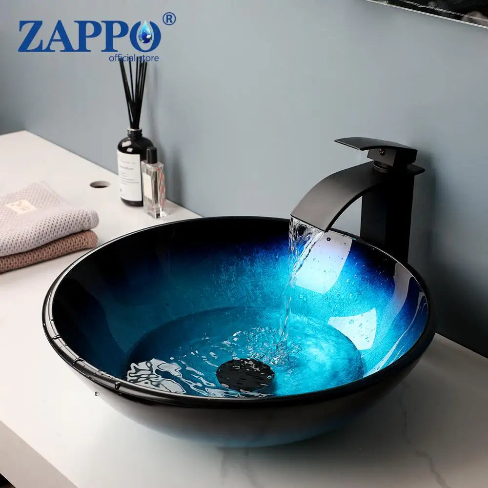 ZAPPO Blue Tempered Glass Vessel Sink – Oval Above-Counter Basin with Black Waterfall Faucet